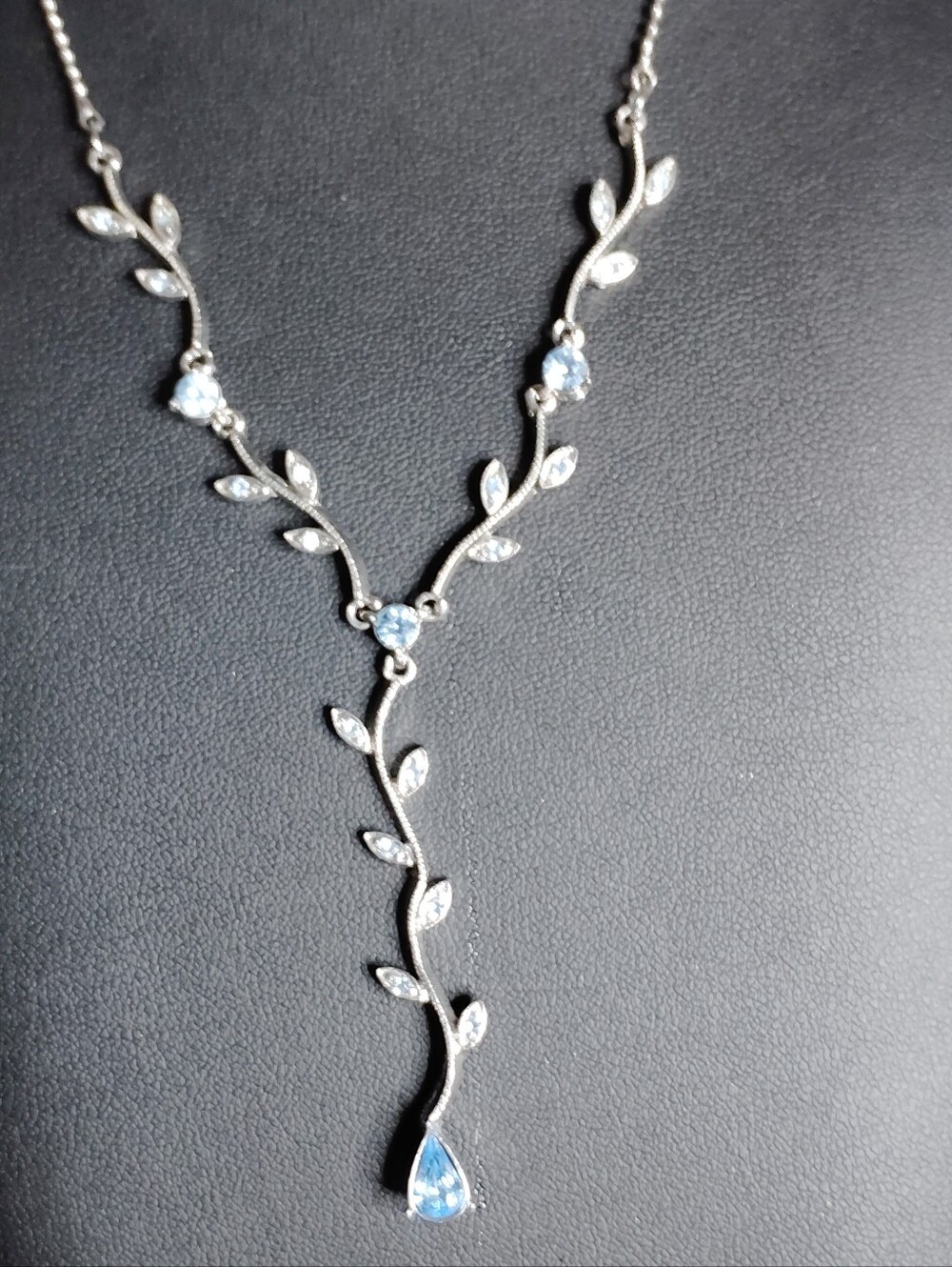 Delicate Silver Vine Necklace with Light Blue Teardrop Accent
